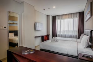 Standard Room, 2 Twin Beds | In-room safe, desk, laptop workspace, blackout drapes - PrimeBiz Hotel Surabaya (Surabaya)
