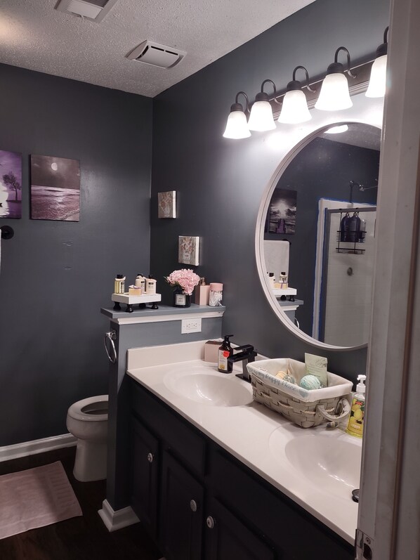 Shower, hair dryer, towels, soap