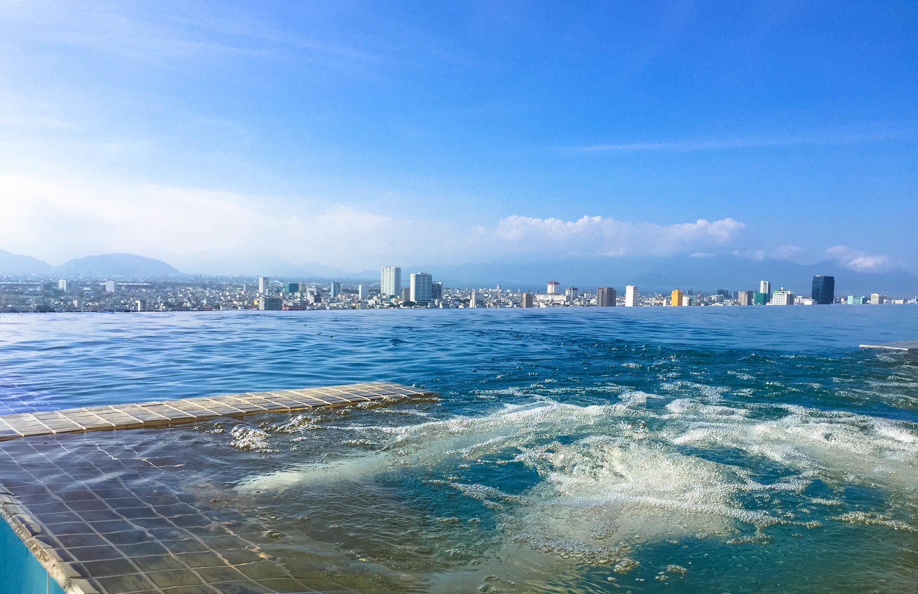 outdoor pool, open 6 am to 9 pm, pool umbrellas, pool loungers