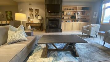 Smart TV, fireplace, books