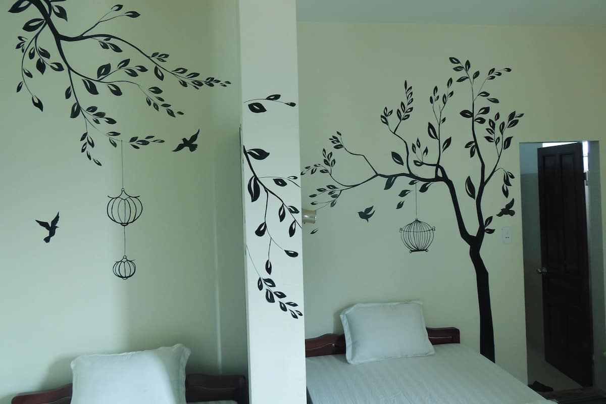 Chambre avec lits jumeaux | Minibar, bureau, Wi-Fi gratuit