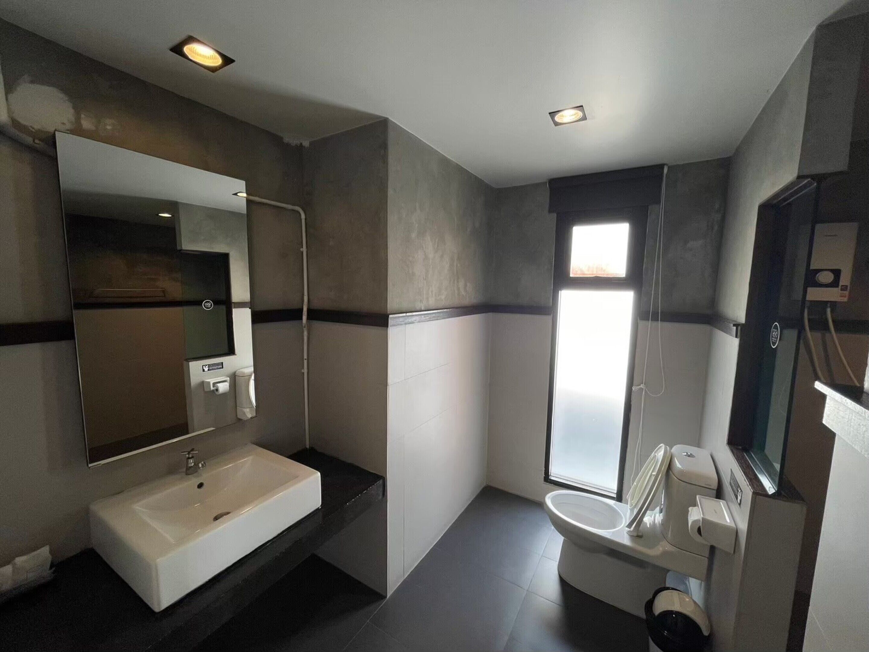 superior double room | bathroom | shower, free toiletries, hair dryer, towels