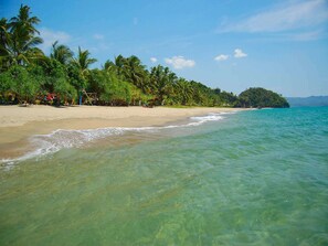 On the beach, free beach cabanas, sun-loungers, beach towels