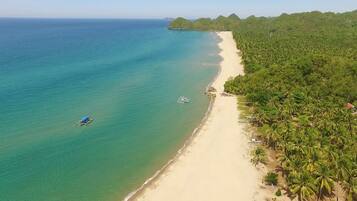 On the beach, free beach cabanas, sun loungers, beach towels