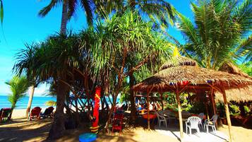 On the beach, free beach cabanas, sun loungers, beach towels