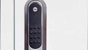 A Yale smart lock on a door. - Drive-in Motell (Mjolby)