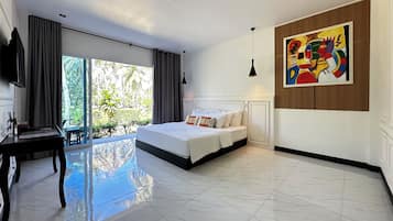 Habitación Deluxe doble, 1 cama doble, vistas al jardín | Minibar con artículos gratuitos, escritorio, wifi gratis y ropa de cama