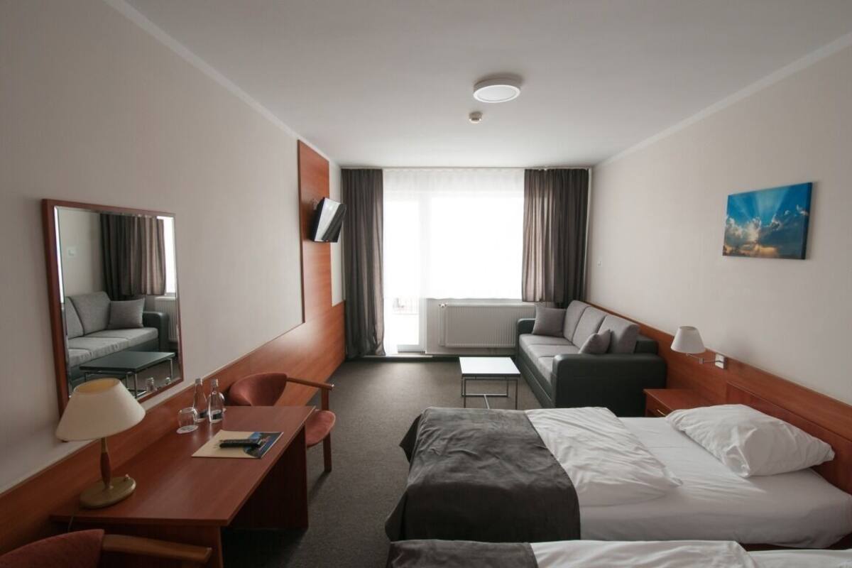 Double Room, Lake View | Desk, iron/ironing board, free cots/infant beds, rollaway beds