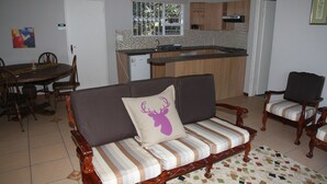 Family Cottage, 1 Bedroom, Pool View | Living area - Private Cottages (Sandton)