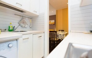 Apartment, 1 Bedroom, Balcony | Private kitchen | Full-size fridge, oven, stovetop, dishwasher - Longhi Holidays House (Rome)