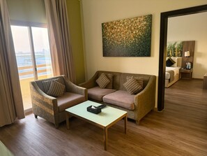 Deluxe Suite | Minibar, in-room safe, desk, iron/ironing board - Royal View Hotel (Ras Al Khaimah)