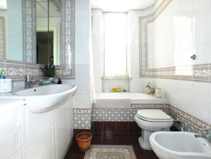 Apartment, 1 Bedroom | Bathroom | Shower, free toiletries, hair dryer, bidet