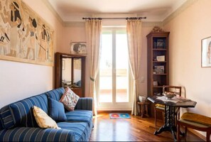 Apartment, 1 Bedroom | Living area | Flat-screen TV