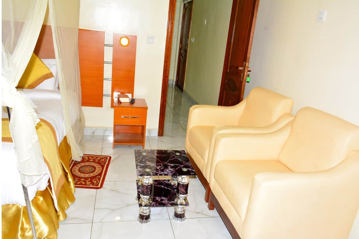 Family Apartment | Living area | Flat-screen TV