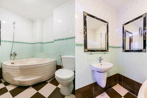 Un baño con bañera, inodoro y lavamanos.