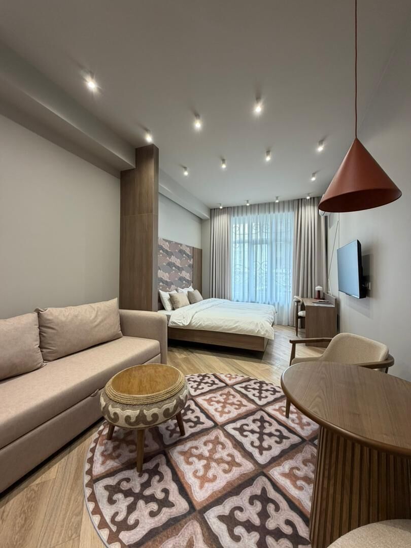 Premium bedding, down comforters, minibar, in-room safe
