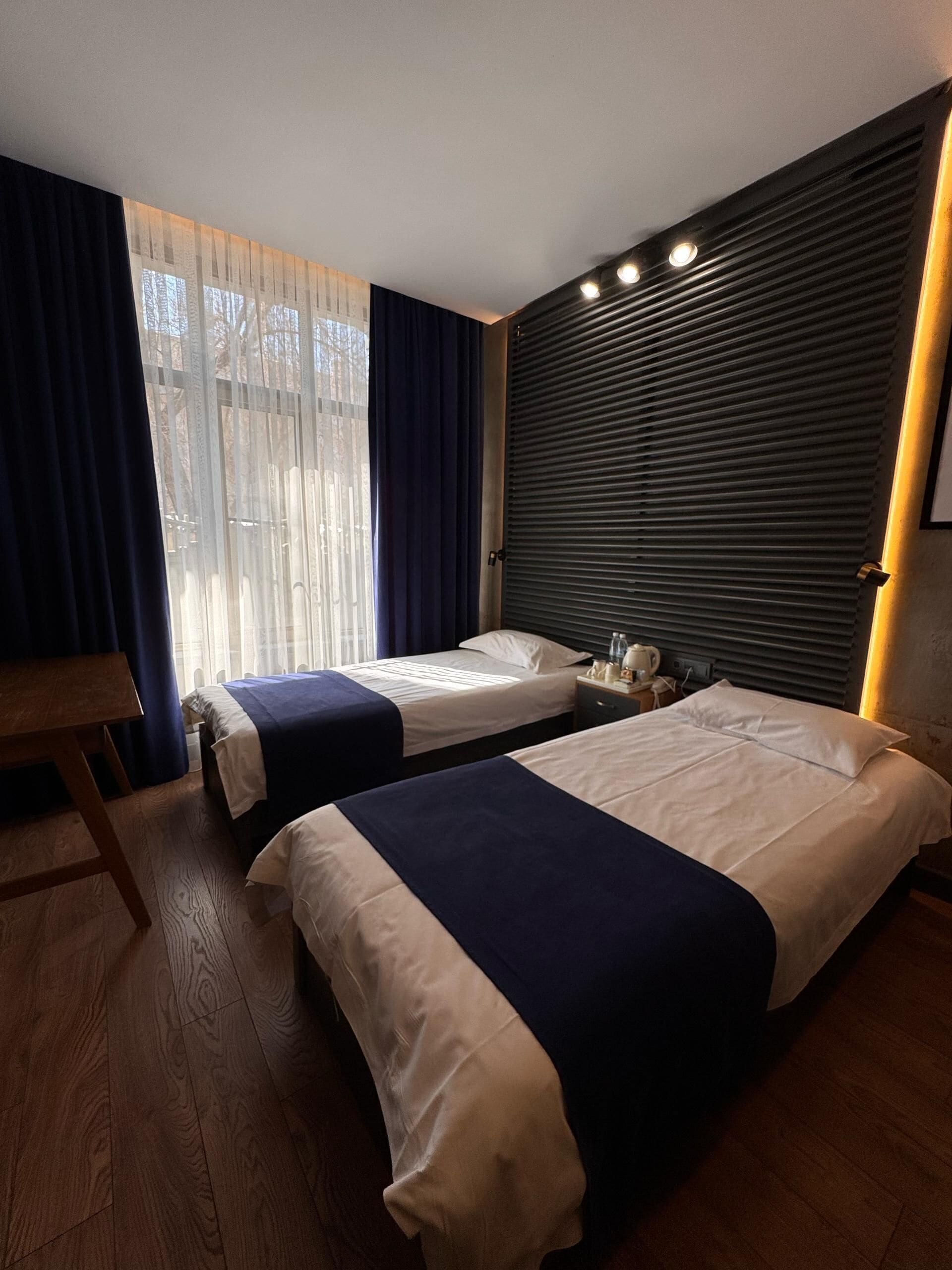 Premium bedding, down comforters, minibar, in-room safe
