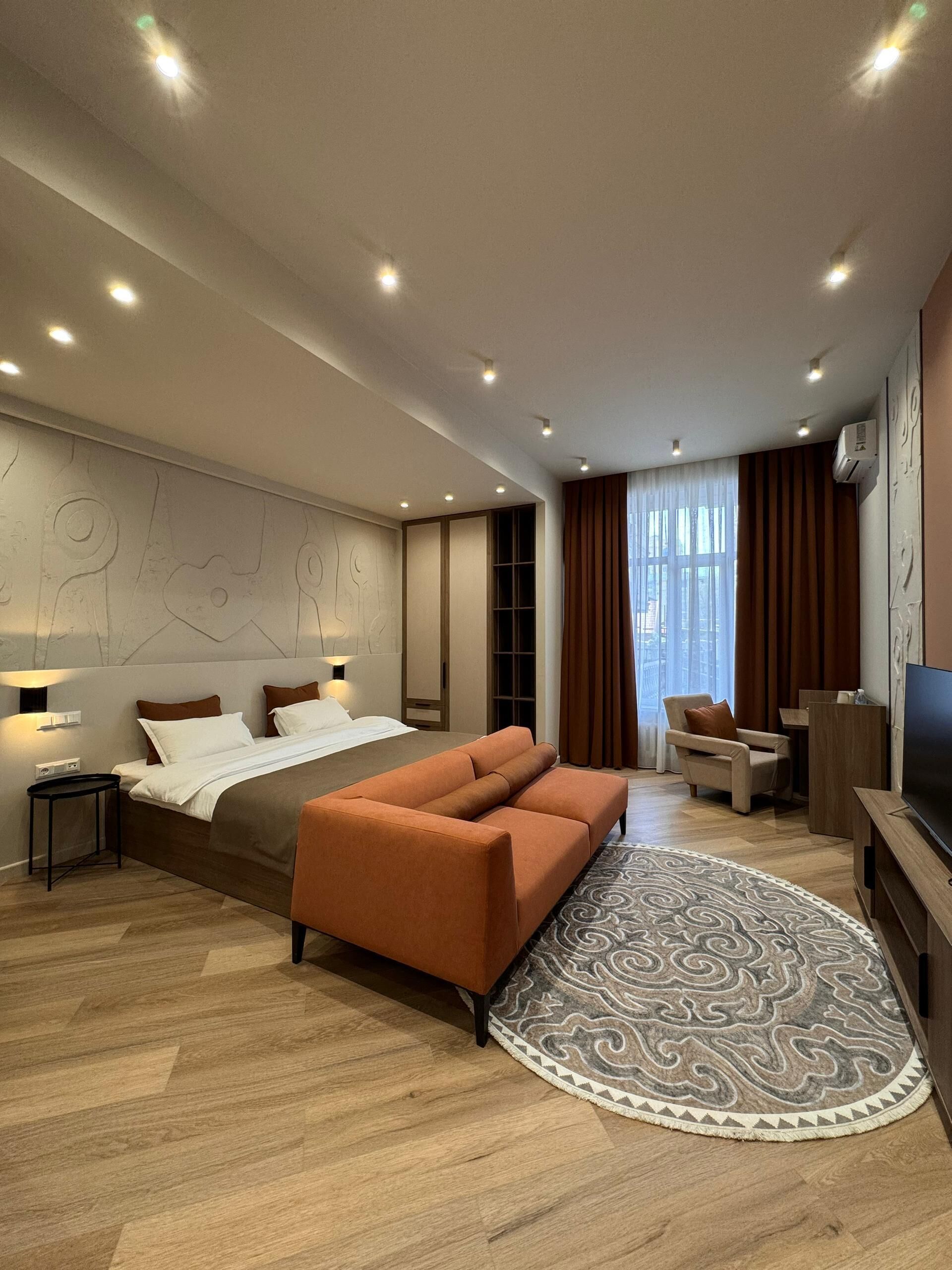 Suite studio exclusive | Literie de qualité, couette en duvet, minibar, coffre-fort