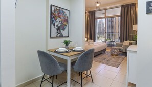 Superior Studio, 1 Queen Bed, City View | Living area | Flat-screen TV - HiGuests - Sky Views   (Dubai)