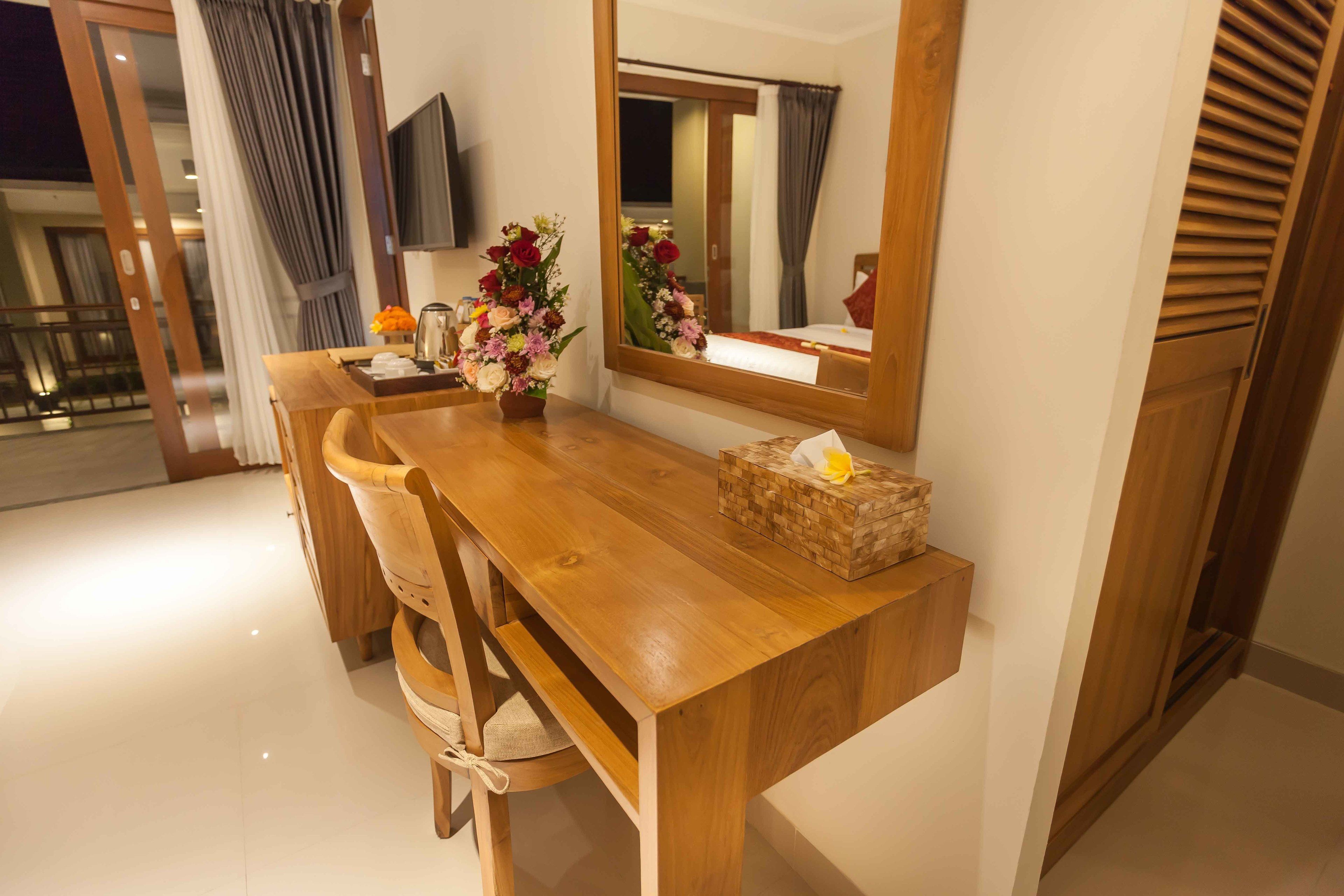 family room | minibar, in-room safe, desk, blackout curtains