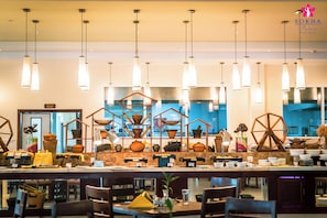 Breakfast, lunch, dinner served; local and international cuisine