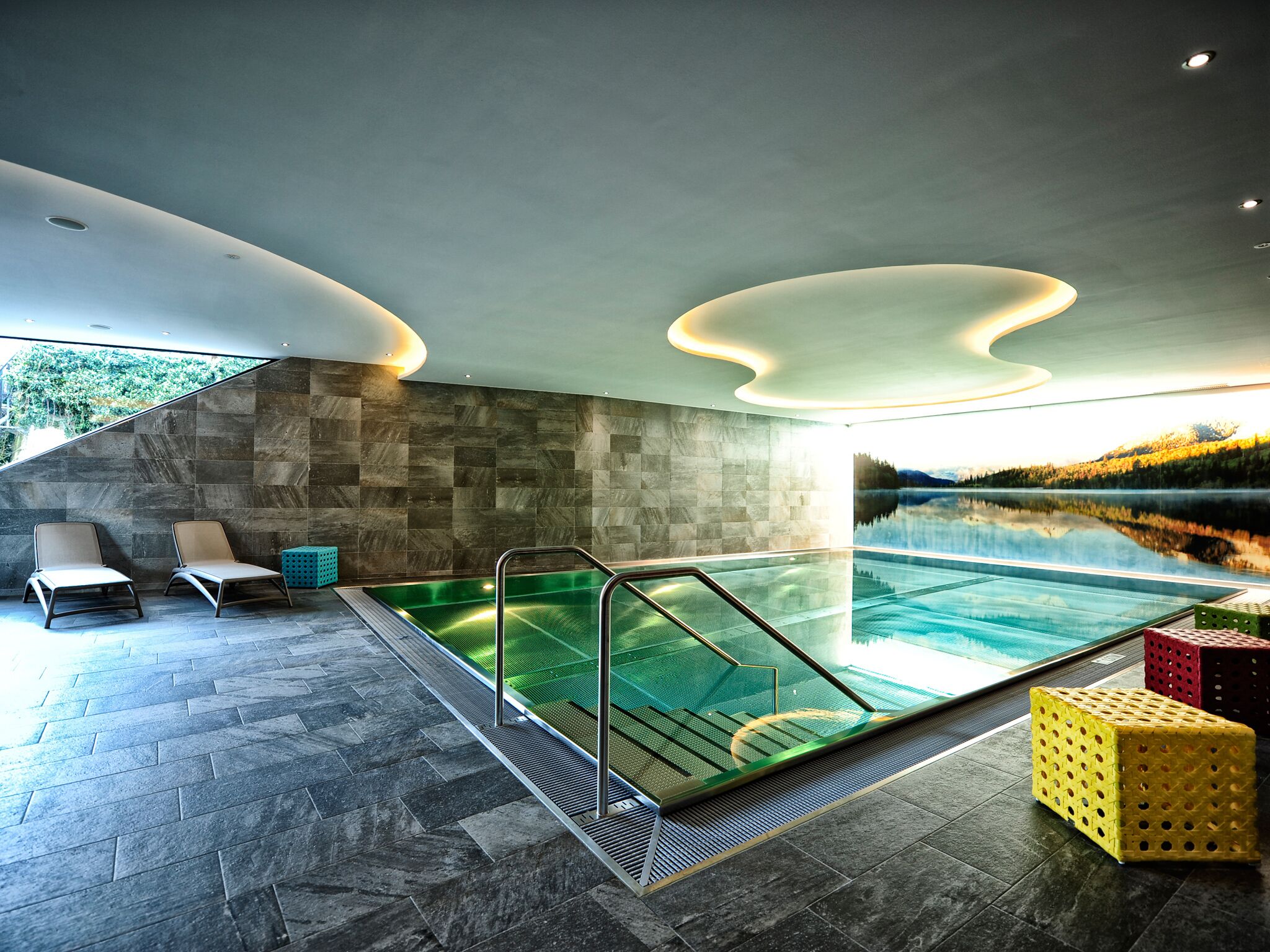 Indoor pool, pool umbrellas, sun loungers