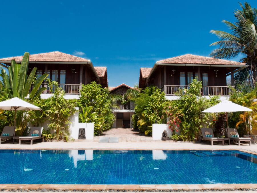 Outdoor pool, open 7 AM to 9 PM, pool umbrellas, sun loungers
