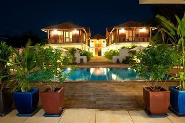 Outdoor pool, open 7 AM to 9 PM, pool umbrellas, sun loungers