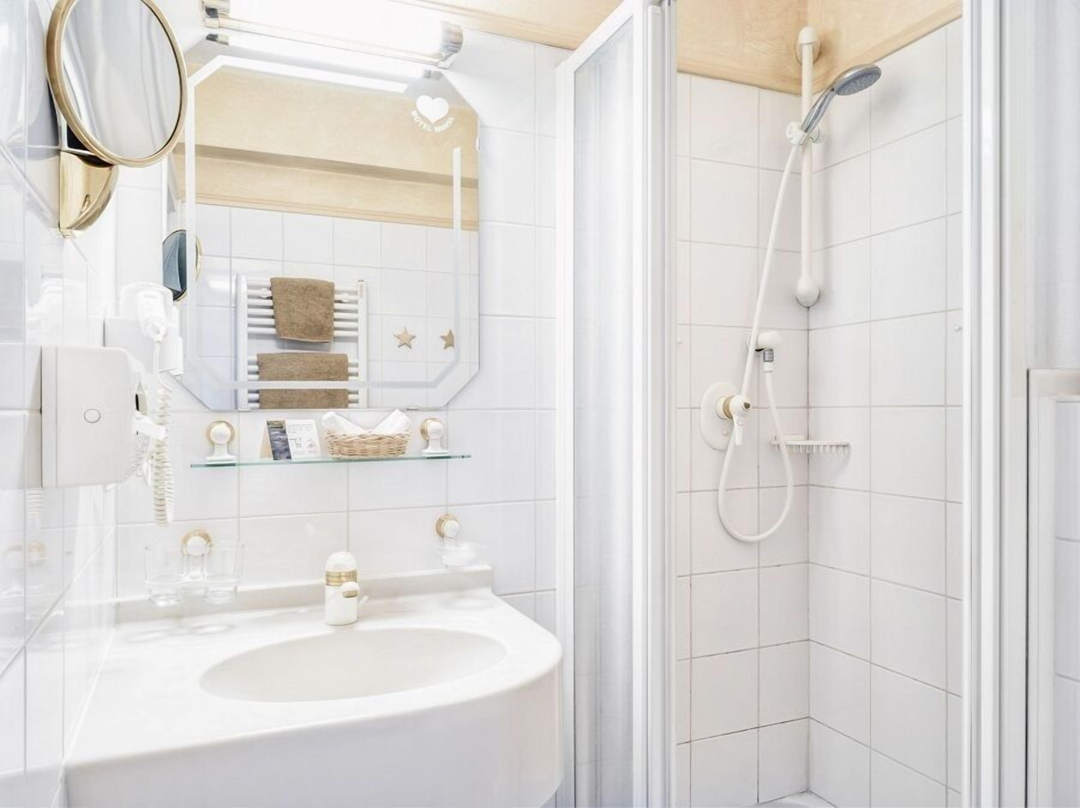 eco-friendly toiletries, hair dryer, bathrobes, towels