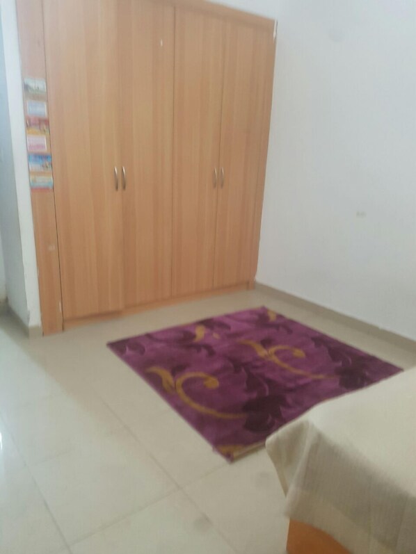 Apartment, 1 Bedroom | 1 bedroom, in-room safe, desk, iron/ironing board