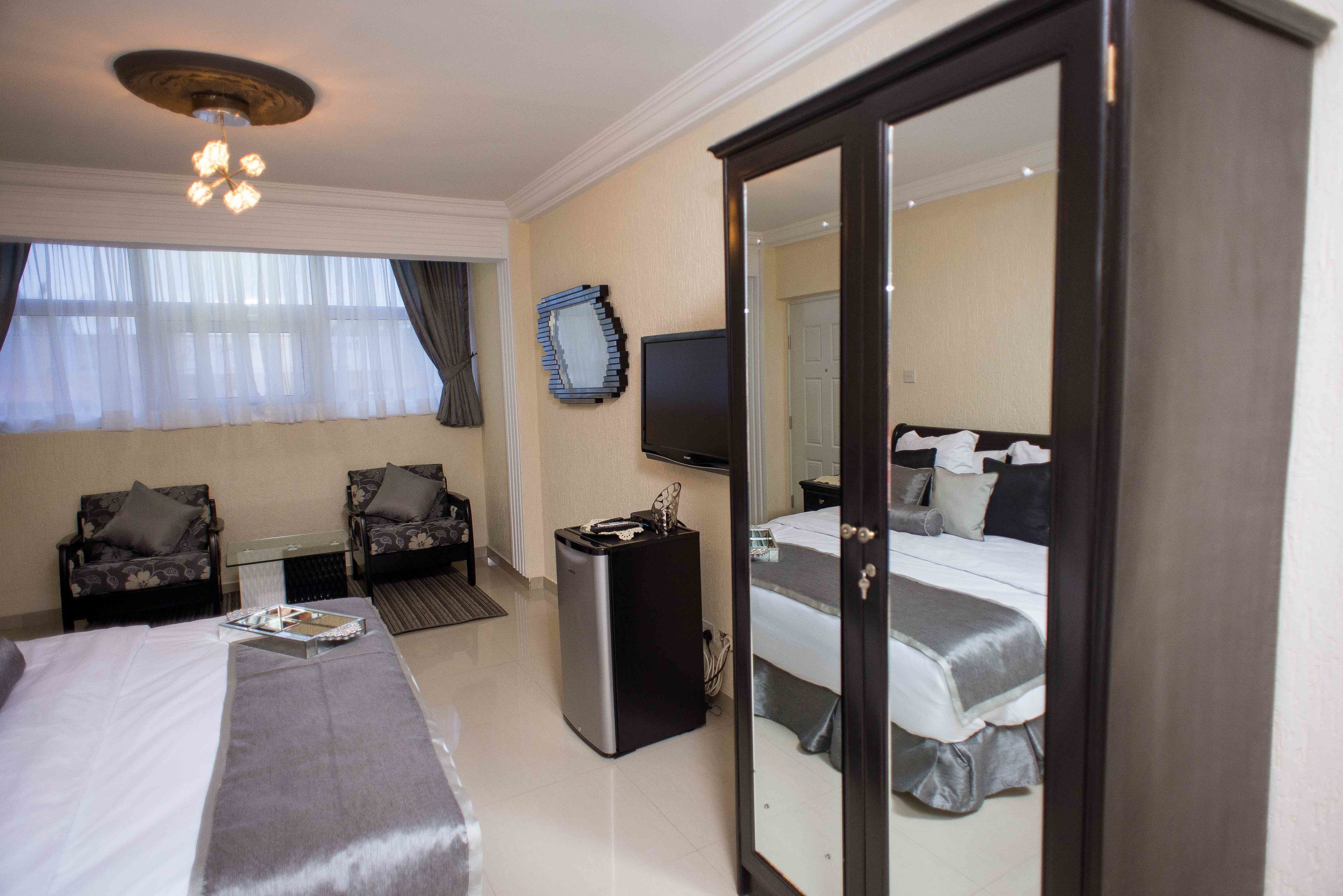 deluxe double room, 1 queen bed, kitchenette | premium bedding, down duvets, pillow-top beds, minibar