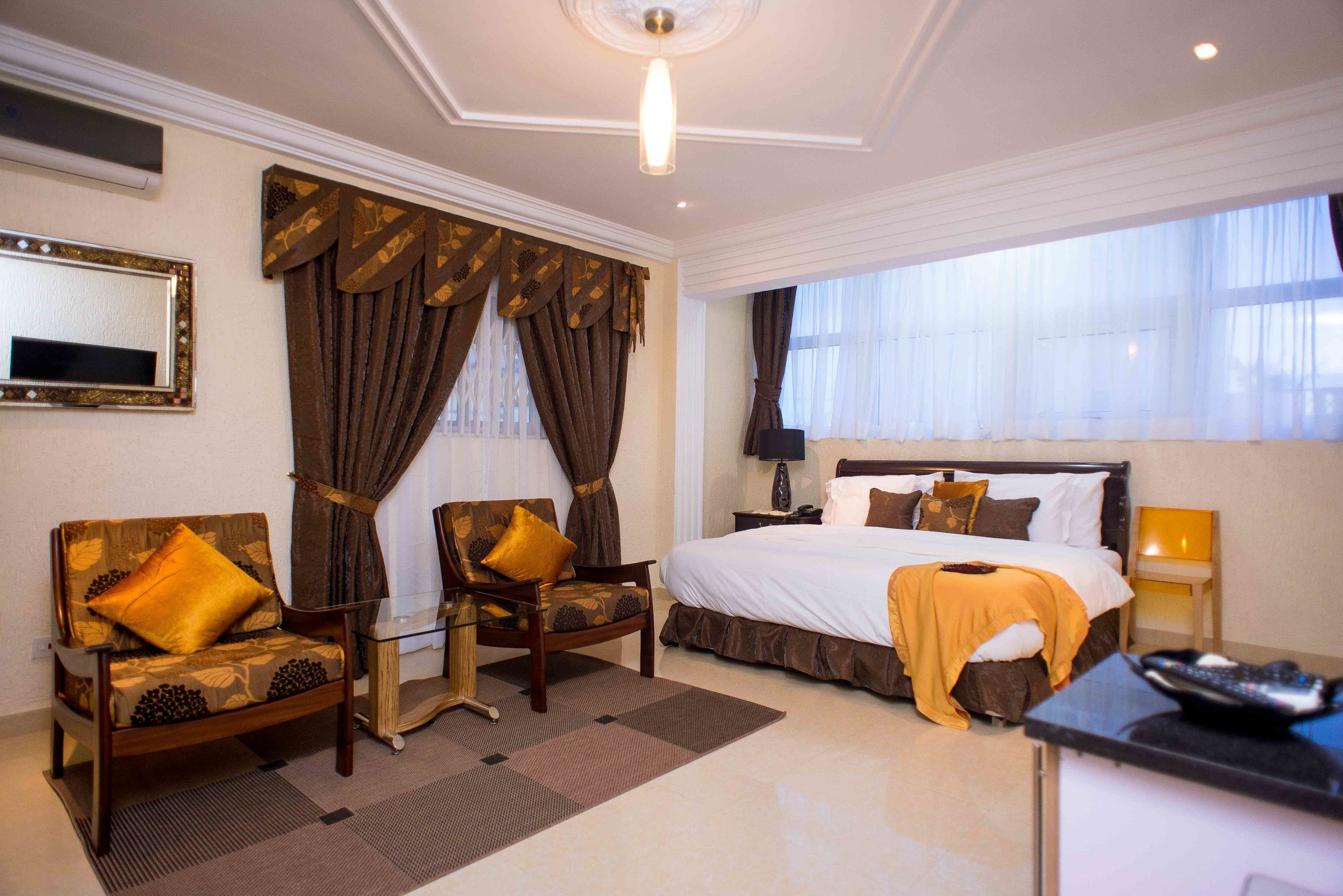 deluxe double room, 1 queen bed, kitchenette | premium bedding, down duvets, pillow-top beds, minibar