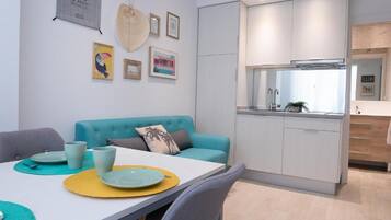 Familie studio | Woonruimte | Flatscreentelevisie