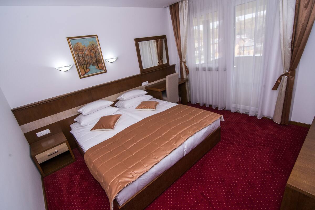 Apartment, 2 Bedrooms, Terrace | Minibar (free items), in-room safe, desk, soundproofing