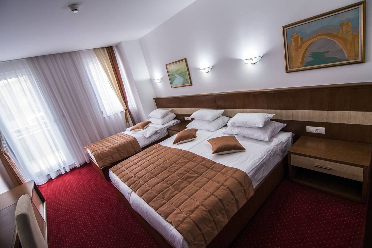 Triple Room, Terrace | Minibar (free items), in-room safe, desk, soundproofing
