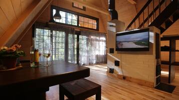 Chalet, véranda, en front de plage | Restauration dans la chambre