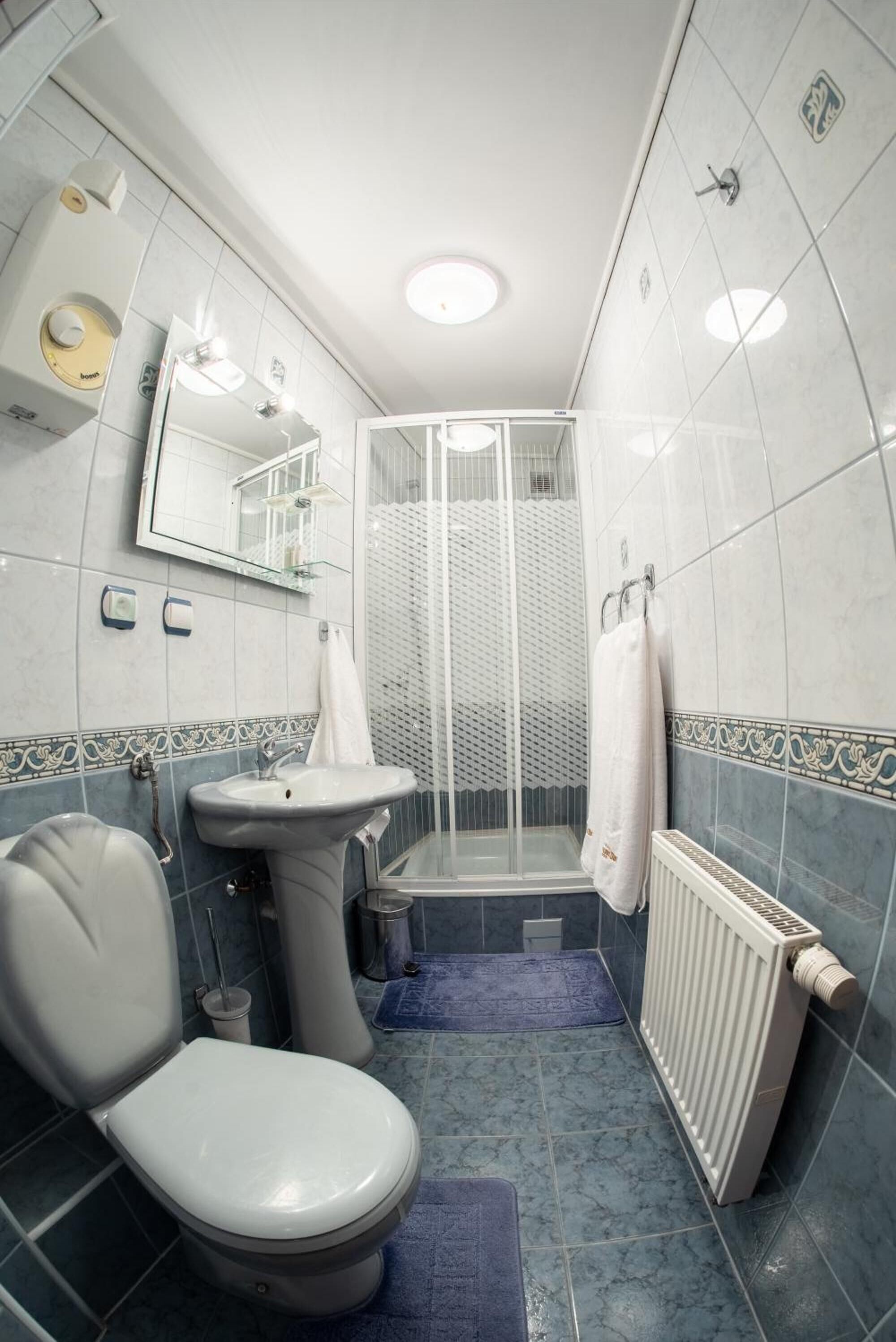 Shower, free toiletries, hair dryer, towels