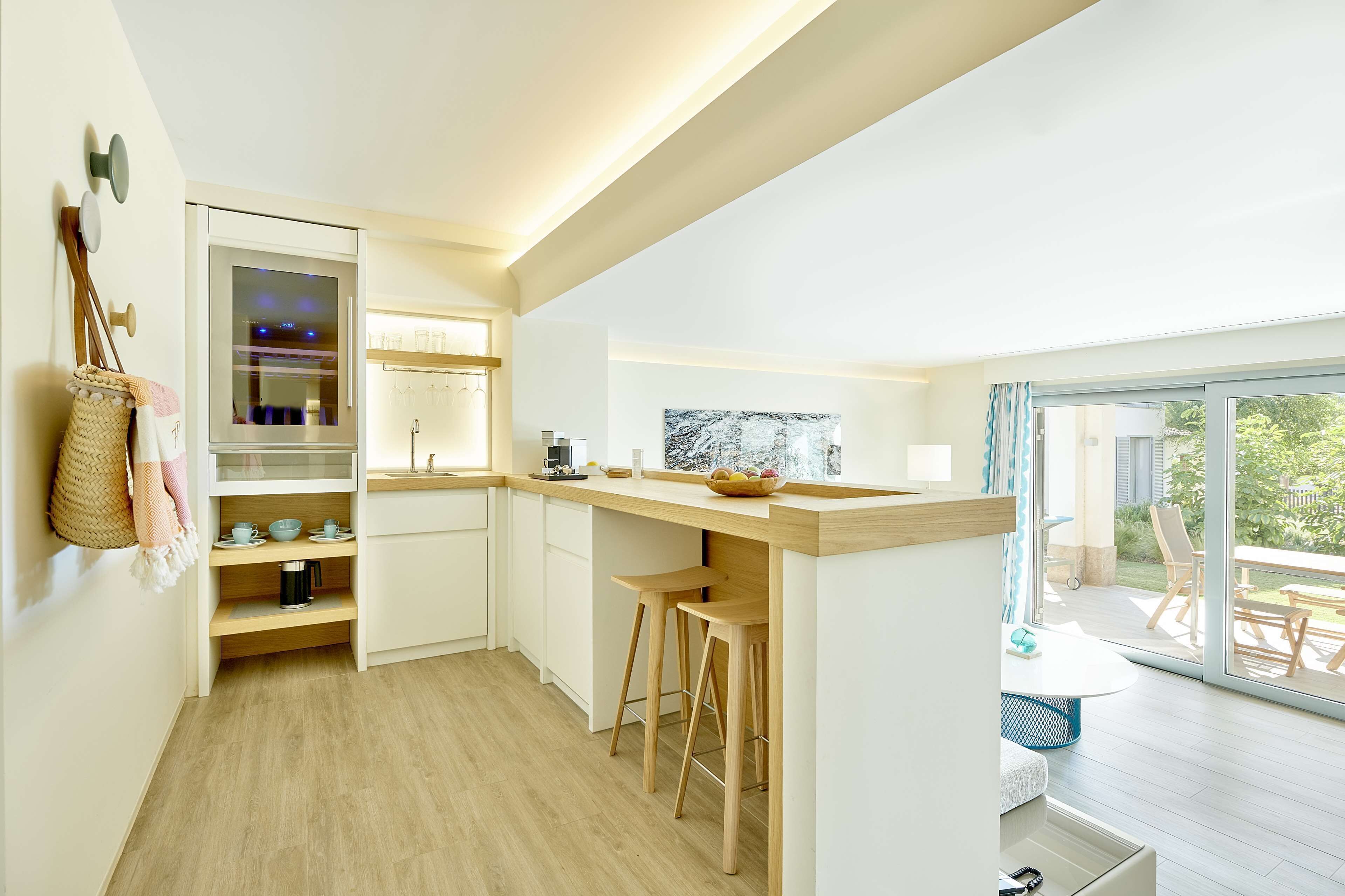 hypo-allergenic bedding, down duvets, minibar, in-room safe