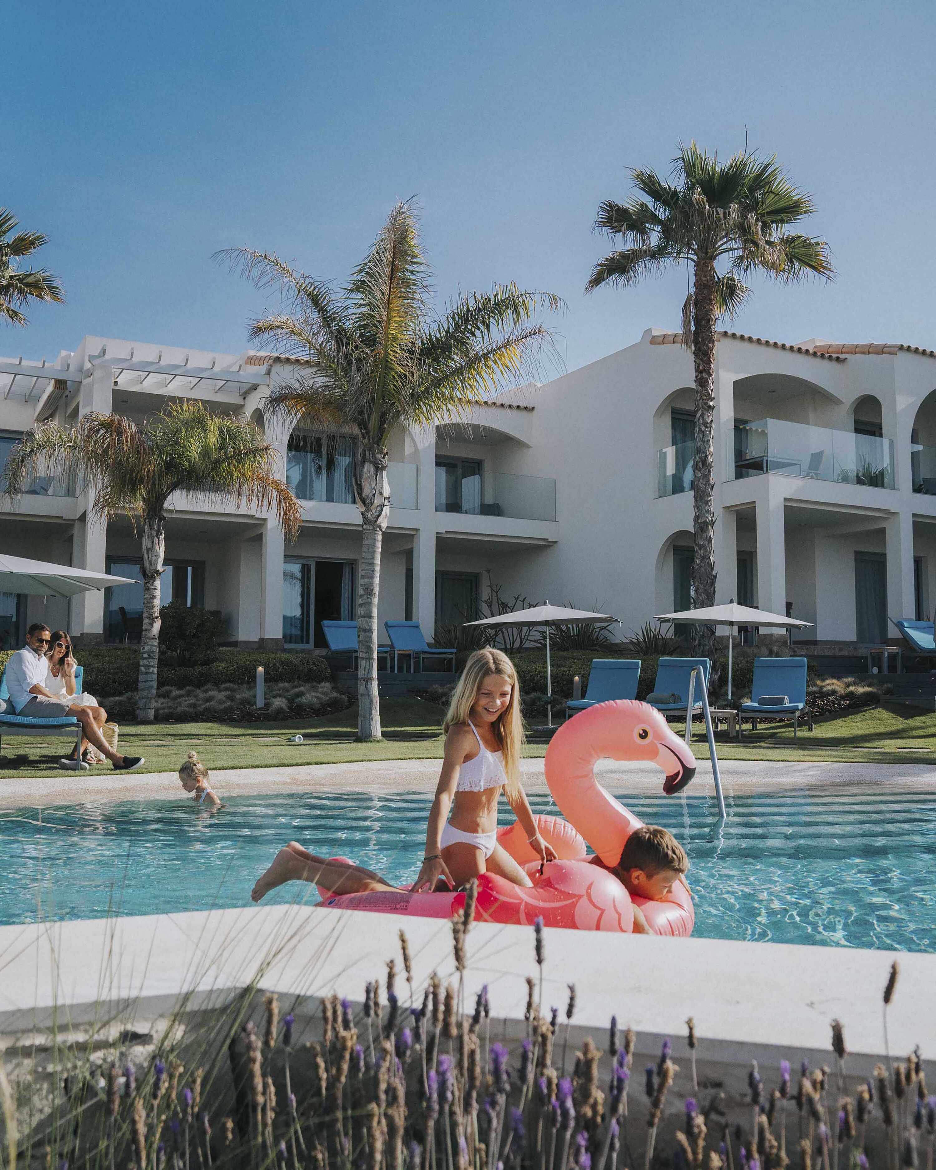 Seasonal outdoor pool, pool cabanas (surcharge), pool umbrellas