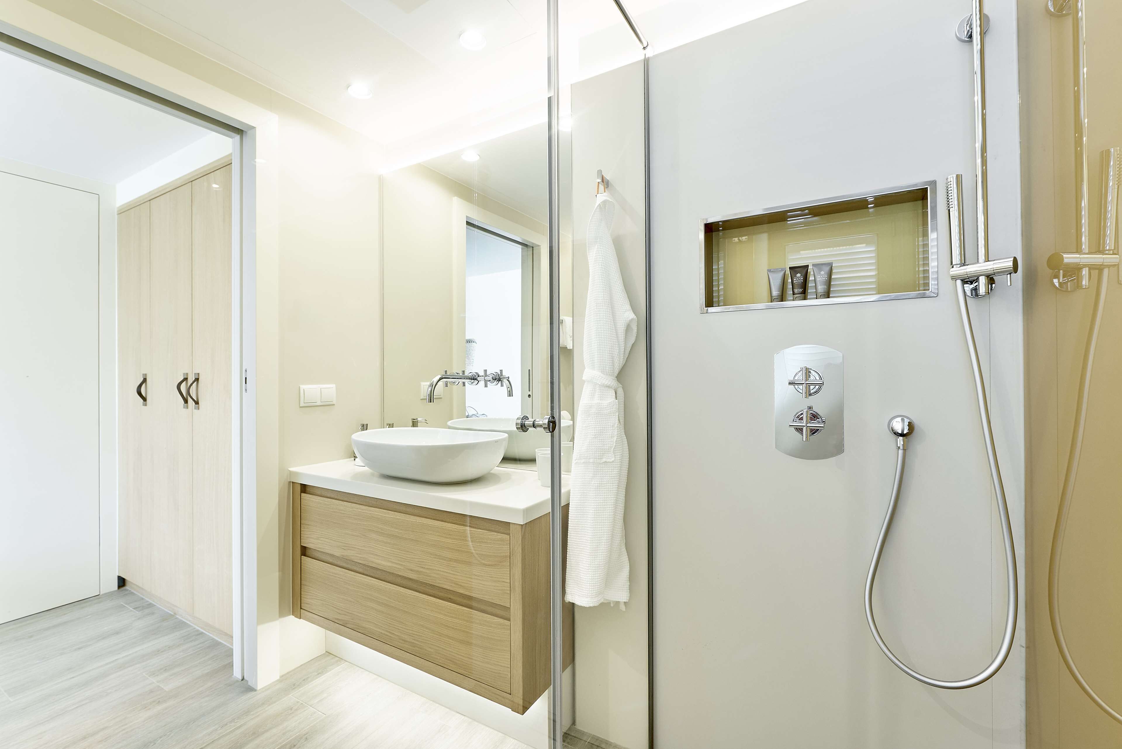 Eco-friendly toiletries, hair dryer, bathrobes, slippers