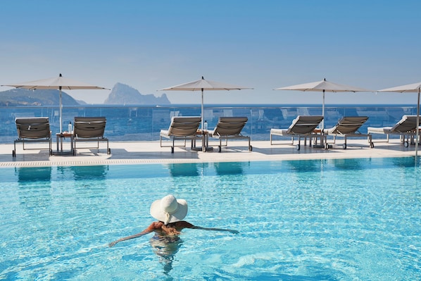 Seasonal outdoor pool, pool cabanas (surcharge), pool umbrellas