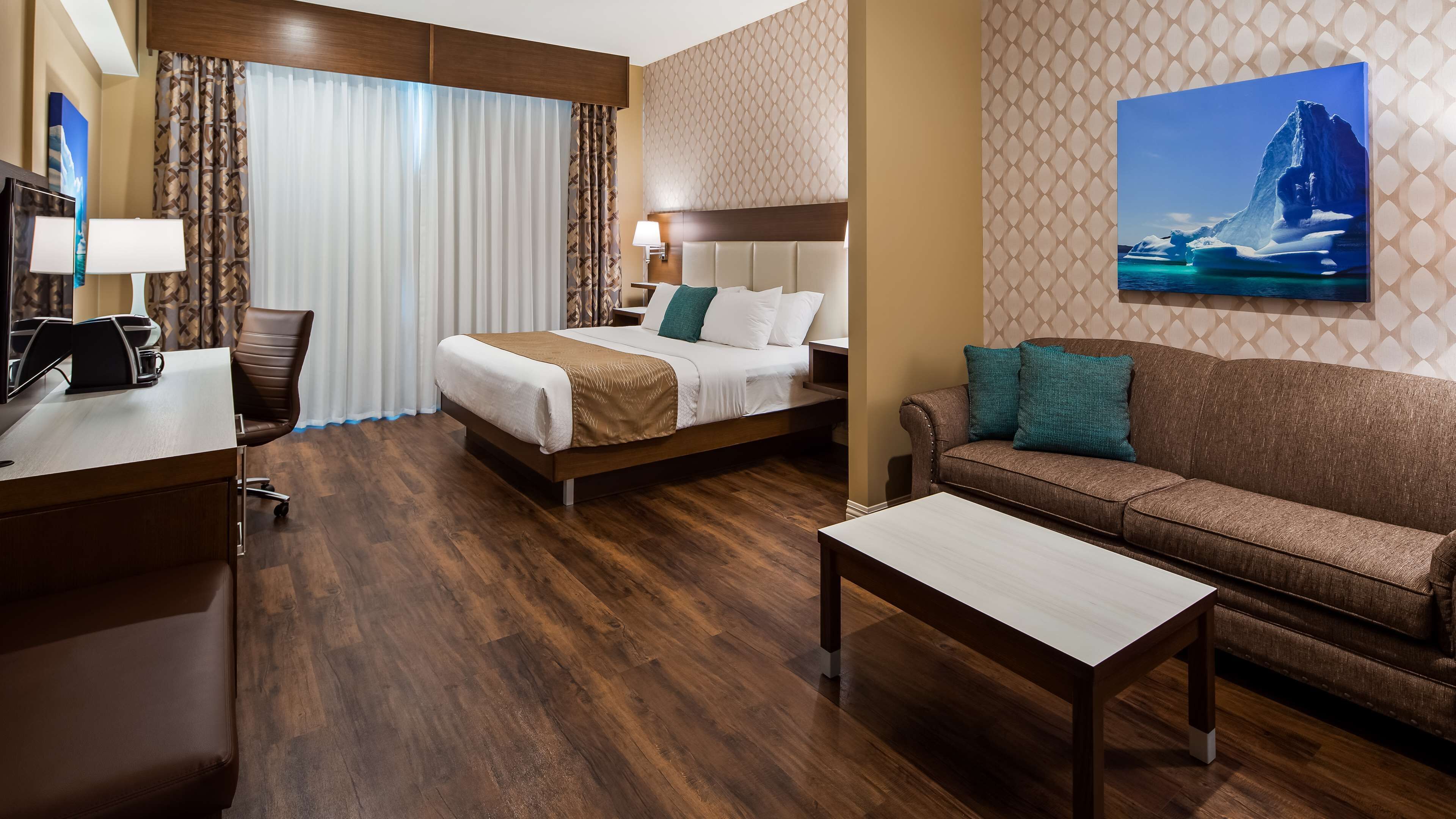 suite, 1 king bed, non smoking, fireplace | in-room safe, desk, blackout curtains, soundproofing