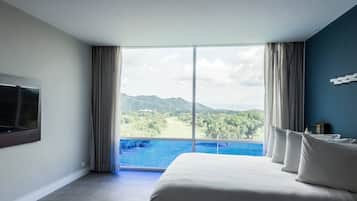 Chambre Standard, 1 trĂšs grand lit, non-fumeurs, vue golf | Coffres-forts dans les chambres, bureau, rideaux occultants