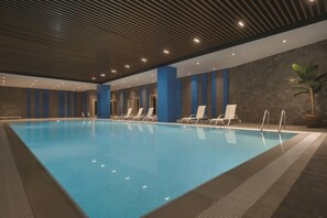 Indoor pool, open 10:00 AM to 10:00 PM, sun loungers