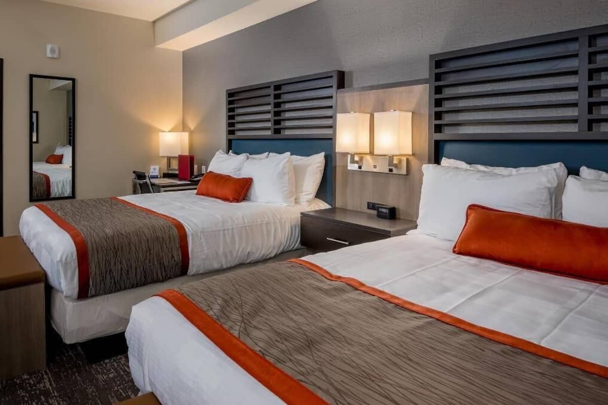 Pillowtop beds, desk, blackout drapes, iron/ironing board