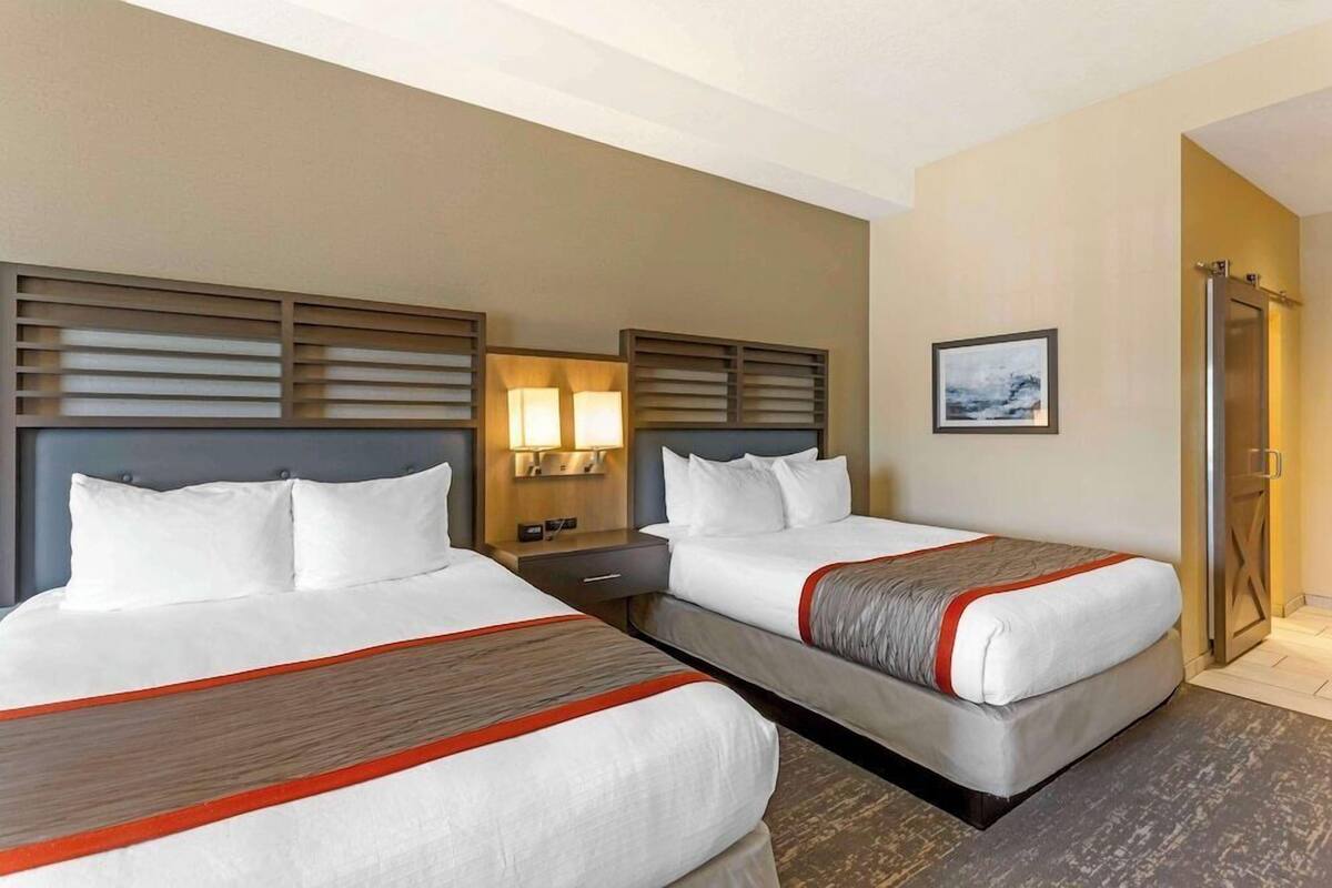 Pillowtop beds, desk, blackout drapes, iron/ironing board