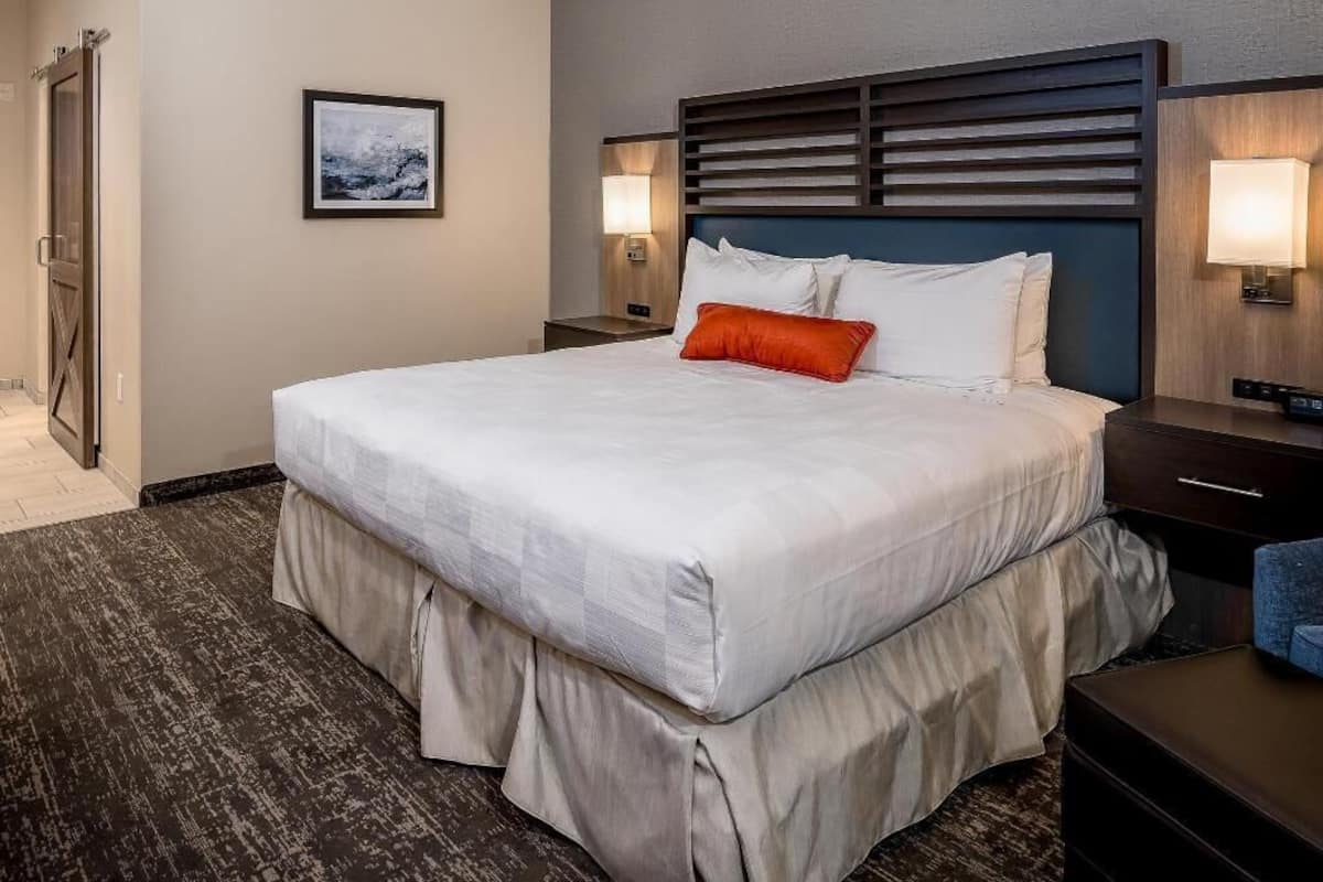Pillowtop beds, desk, blackout drapes, iron/ironing board