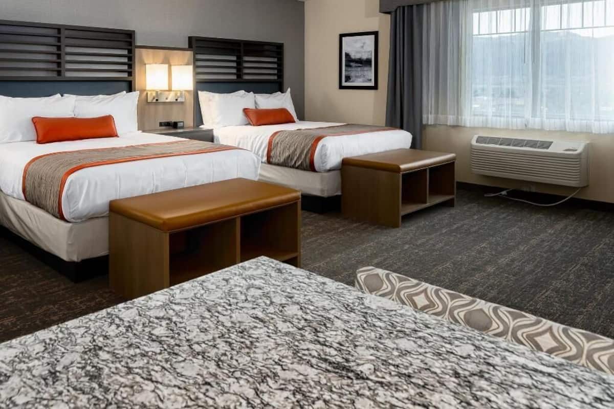 Pillowtop beds, desk, blackout drapes, iron/ironing board