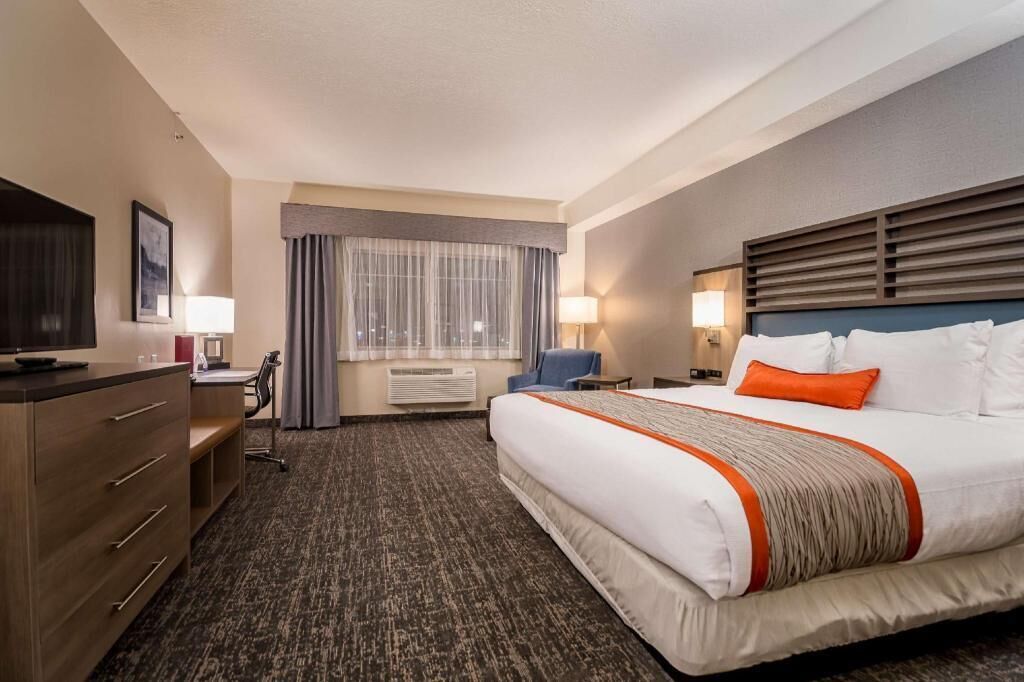 Pillowtop beds, desk, blackout drapes, iron/ironing board