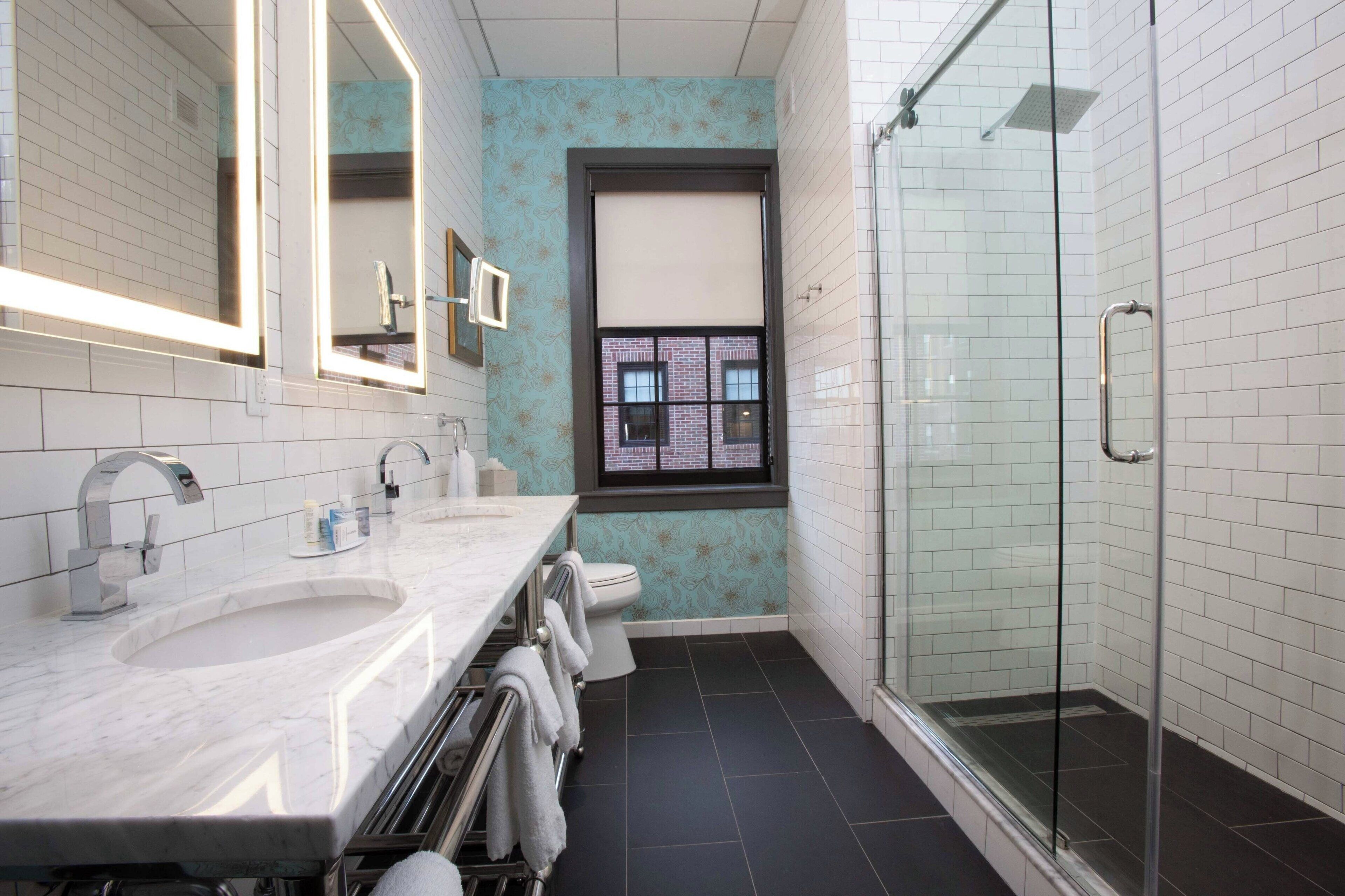 studio, 1 king bed with sofa bed, city view, corner | bathroom | shower, rainfall showerhead, designer toiletries, hair dryer